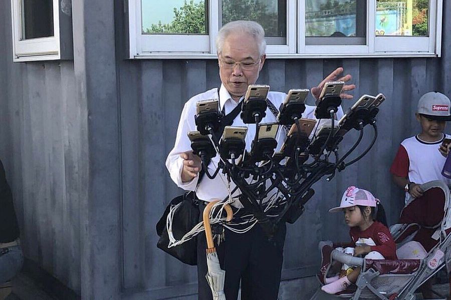 Asia's Latest Pokémon GO Icon Is a Taiwanese Grandpa Who Uses 11 Phones to Play