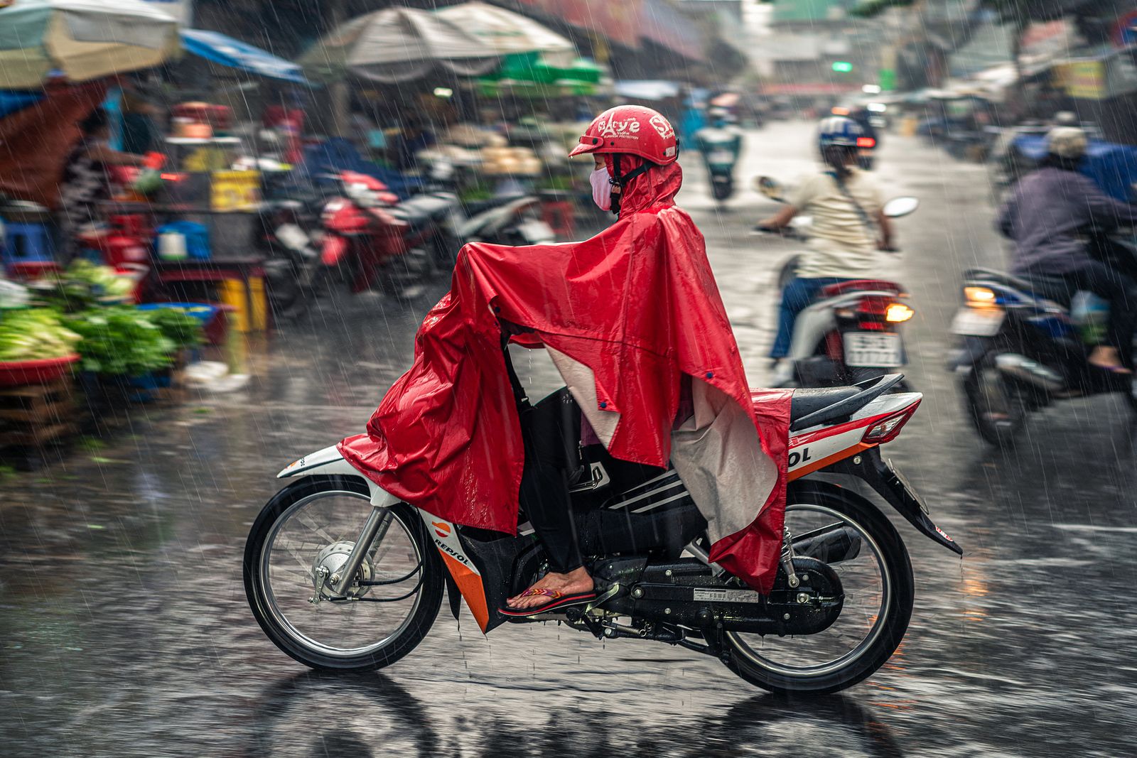 Photos] The Joy and Heady Rush of Getting Caught in Saigon's Off-Season Rain  - Saigoneer