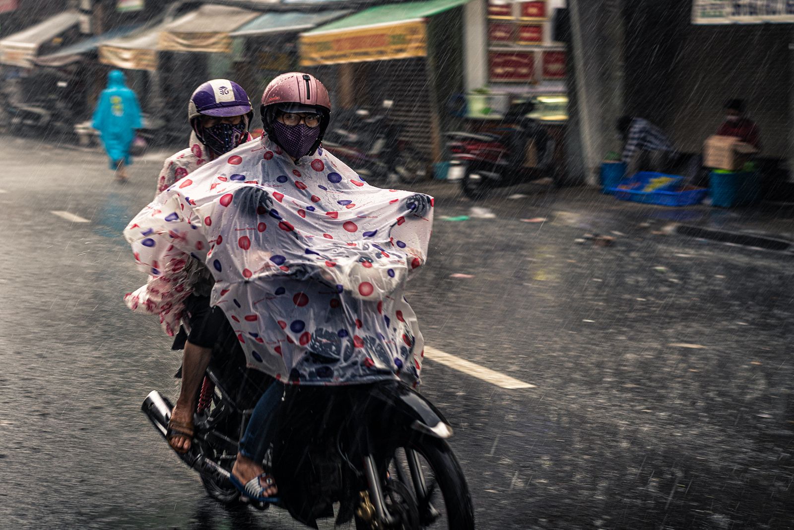 Photos] The Joy and Heady Rush of Getting Caught in Saigon's Off-Season Rain  - Saigoneer