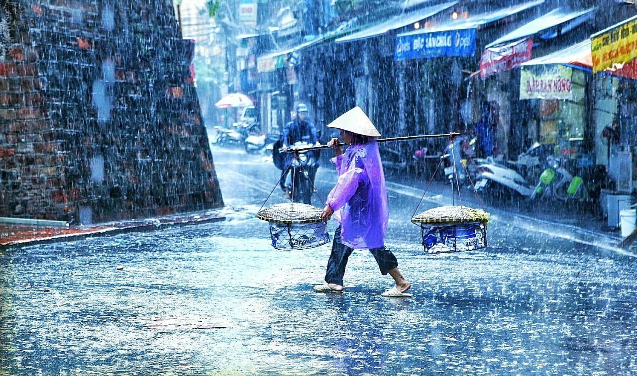 [Photos] Rainy Season in Vietnam An Ode to Boats, Raincoats and